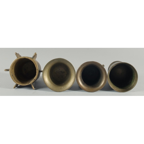 245 - A COLLECTION OF FOUR BRONZE PESTLE AND MORTARS, (eight pieces).