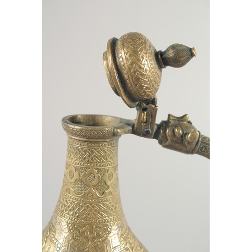 255 - A FINE EARLY 19TH CENTURY INDIAN PARSI SILVER INLAID BRASS EWER, with hinged lid, engraved decoratio... 