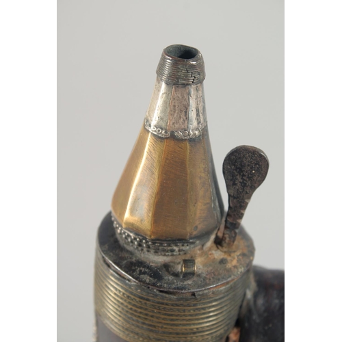 257 - AN EARLY 19TH CENTURY ARAB OMANI SILVER OVERLAID STEEL POWDER FLASK, 23cm.