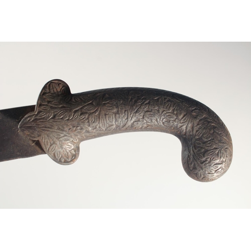 258 - A 19TH CENTURY INDIAN KUKRI BROAD-BLADED KNIFE, with chased handle, 47cm long.