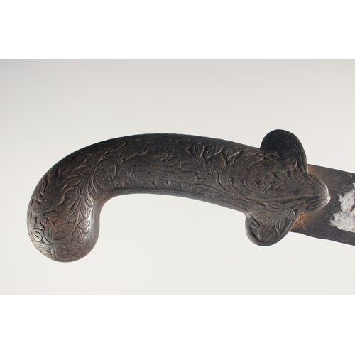 258 - A 19TH CENTURY INDIAN KUKRI BROAD-BLADED KNIFE, with chased handle, 47cm long.