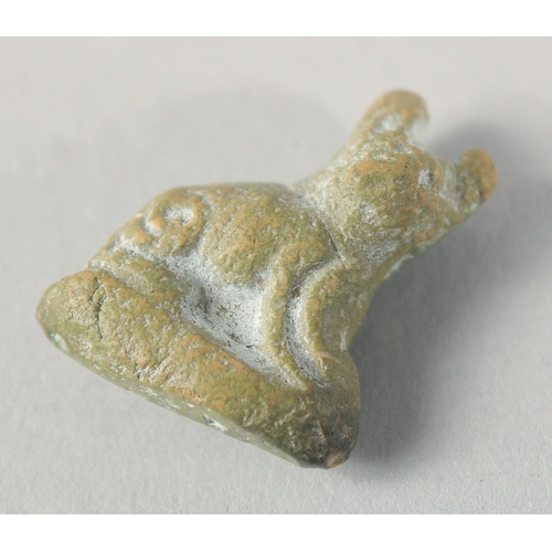 267 - TWO EARLY ISLAMIC CARVED ROCK CRYSTAL ANIMAL FORM BEADS, together with another cat shape bead, (3).