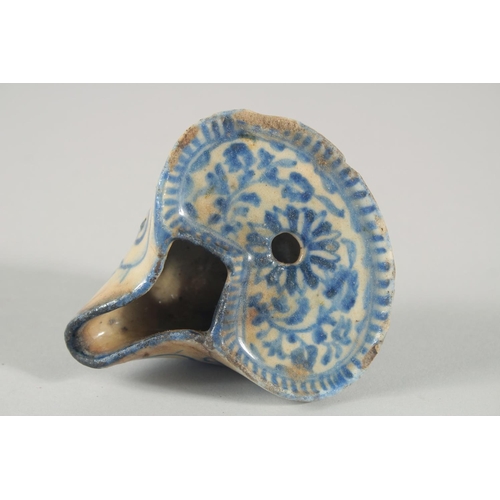 276 - A 17TH CENTURY PERSIAN SAFAVID GLAZED POTTERY OIL LAMP, 10cm.