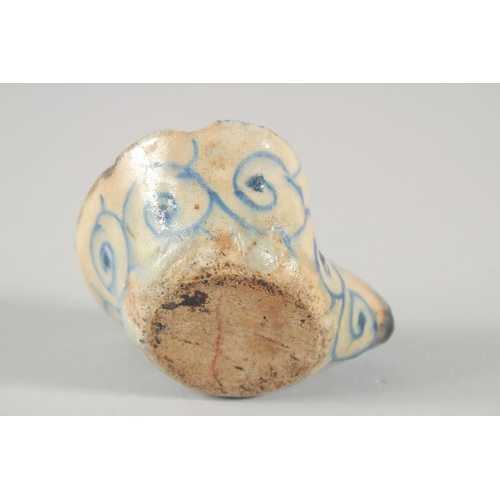 276 - A 17TH CENTURY PERSIAN SAFAVID GLAZED POTTERY OIL LAMP, 10cm.