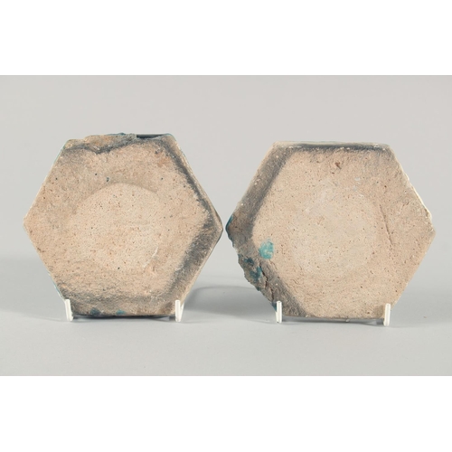 278 - A PAIR OF 13TH CENTURY PERSIAN SELJUK GLAZED POTTERY HEXAGONAL TILES, with raised floral motif decor... 