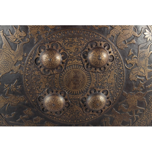 280 - A VERY FINE 19TH CENTURY NORTH INDIAN GOLD OVERLAID CHISELLED STEEL SHIELD, possibly Sikh, decorated... 