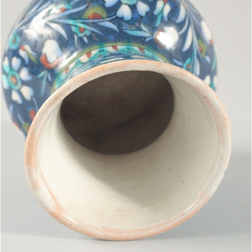 282 - TWO IZNIK STYLE PALESTINIAN JERUSALEM VASES, 13.5cm and 11.5cm high.