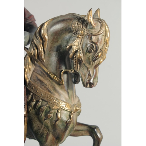 287 - A LARGE 19TH CENTURY ORIENTALIST COLD PAINTED HORSE AND RIDER, mounted to a green marble base, 62cm ... 