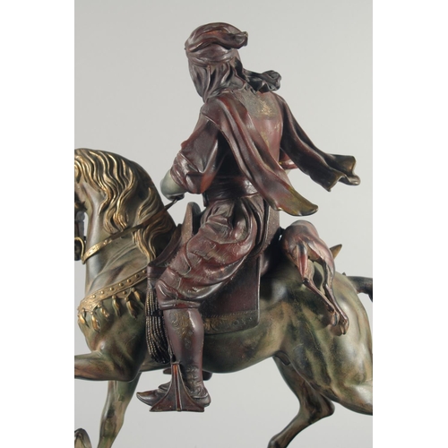 287 - A LARGE 19TH CENTURY ORIENTALIST COLD PAINTED HORSE AND RIDER, mounted to a green marble base, 62cm ... 