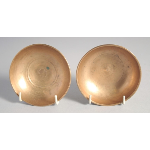 296 - TWO FINE 19TH CENTURY PERSIAN QAJAR ENGRAVED BRASS DRINKING BOWLS, each 9.5cm diameter, (2).