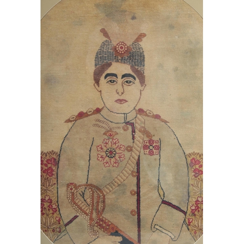 297 - A FINE PERSIAN RAVAR KERMAN FRAMED RUG, depicting Ahmad Shah Qajar; the last ruler of the Qajar dyna... 