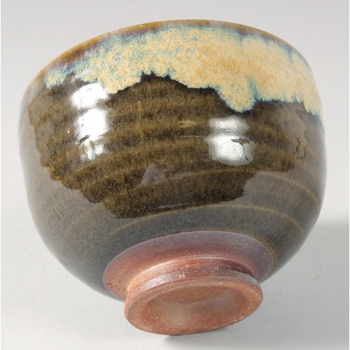 87 - A CONTEMPORARY JAPANESE GLAZED POTTERY BOWL, signed, in original wooden box, bowl 12cm diameter.