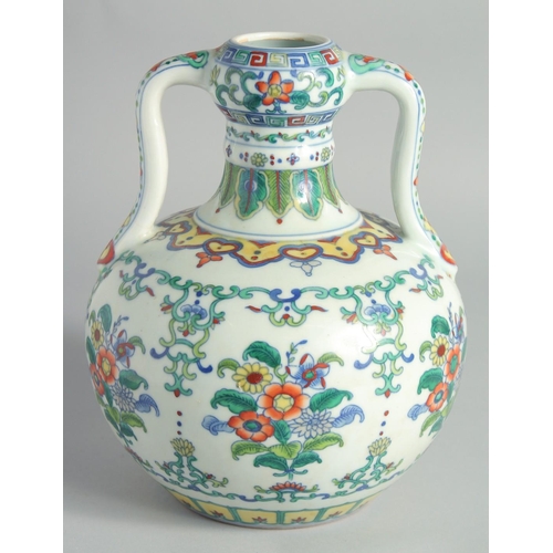 112 - A CHINESE DOUCAI PORCELAIN TWIN HANDLE DOUBLE GOURD VASE, painted with sprays of flora, six-characte... 