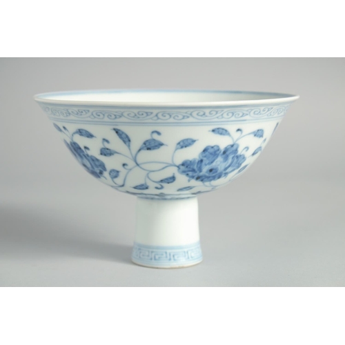 113 - A CHINESE BLUE AND WHITE PORCELAIN STEM CUP, decorated with flowers and vine, with six-character mar... 