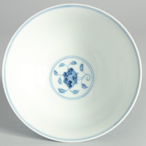 113 - A CHINESE BLUE AND WHITE PORCELAIN STEM CUP, decorated with flowers and vine, with six-character mar... 