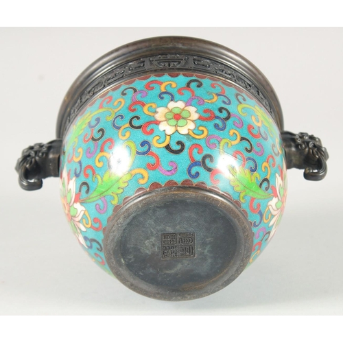 114 - A CHINESE CLOISONNE ENAMELLED BRONZE TWIN HANDLE CENSER, decorated with floral motifs, 19cm wide (ha... 