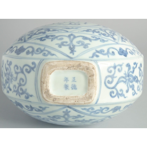 115 - A CHINESE BLUE AND WHITE PORCELAIN TWIN HANDLE MOONFLASK, with a central roundel of characters to ea... 