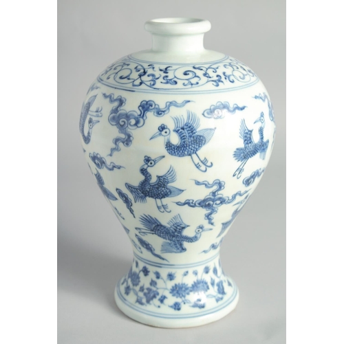 116 - A CHINESE BLUE AND WHITE PORCELAIN MEIPING VASE, decorated with birds and clouds, bearing a six-char... 