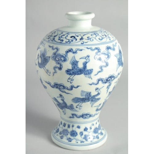 116 - A CHINESE BLUE AND WHITE PORCELAIN MEIPING VASE, decorated with birds and clouds, bearing a six-char... 