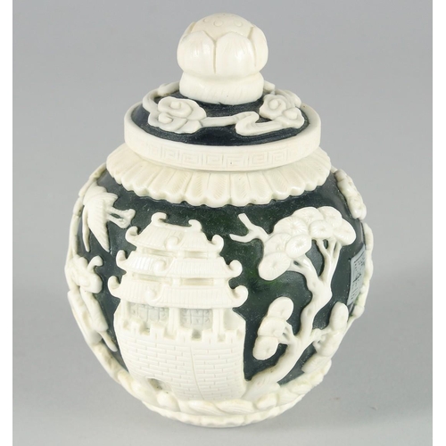 2 - A SMALL CHINESE GREEN GLASS JAR with raised decoration of boating scenes and figures, bearing two ch... 