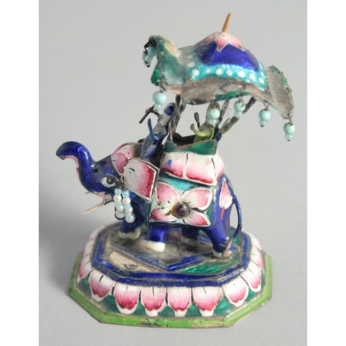 21 - A SMALL INDIAN ENAMELLED SILVER ELEPHANT FIGURE, with riders, 9cm high.