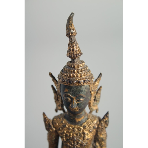 23 - A 19TH CENTURY THAI GILT BRONZE BUDDHA, 15.5cm high.