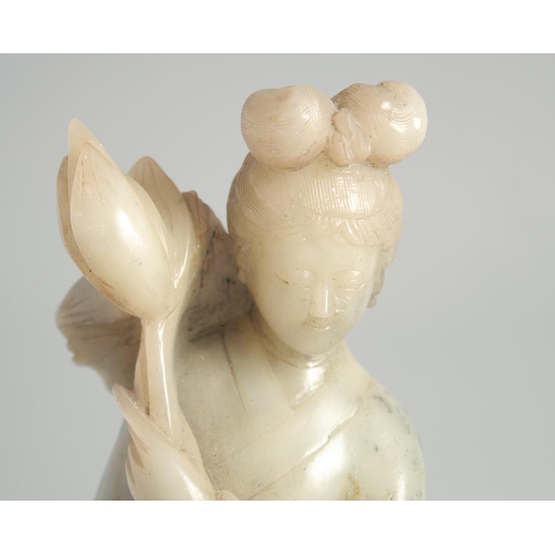 26 - A CHINESE CARVED JADE FIGURE OF GUANYIN, 29cm high.