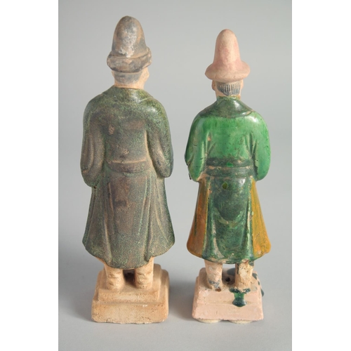 29 - TWO CHINESE SANCAI GLAZED POTTERY FIGURES, 21cm and 20cm high, (2).