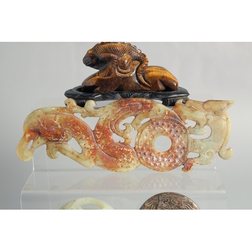 3 - A COLLECTION OF SIX CHINESE HARDSTONE PIECES, comprising a jade puzzle ball, a tiger's eye figure mo... 