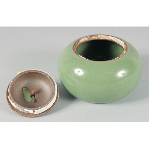 30 - A CELADON CRACKLE GLAZED JAR AND COVER, together with three Korean cups, (4).