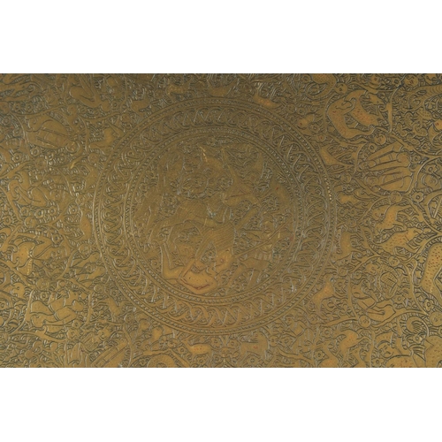 300 - A FINE 19TH CENTURY PERSIAN QAJAR ENGRAVED BRASS TRAY, 38cm diameter.