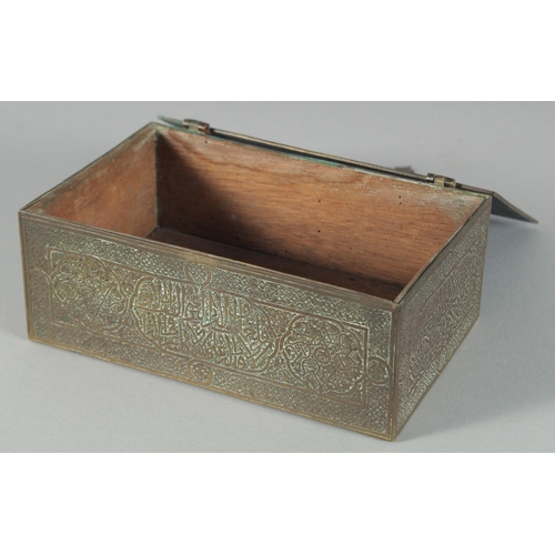 301 - A 19TH CENTURY SYRIAN DAMASCUS ENGRAVED BRASS QURAN BOX, with panels of calligraphy, 14cm x 9cm.