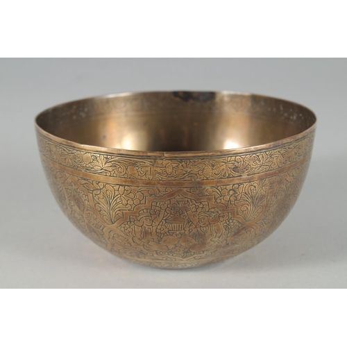 302 - A 19TH CENTURY PERSIAN QAJAR ENGRAVED BRASS BOWL, 12.5cm diameter.