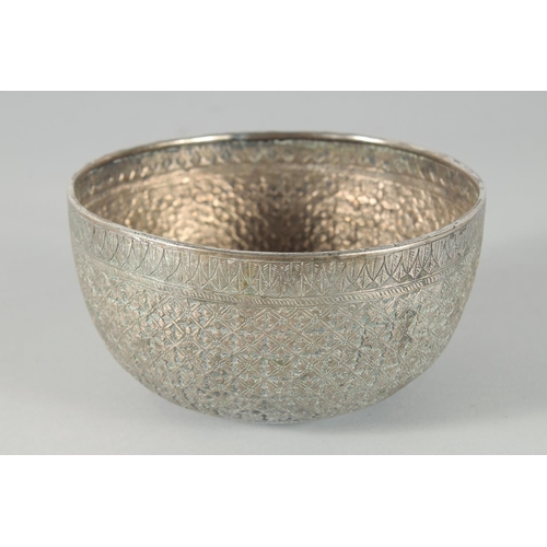 304 - A FINE 19TH CENTURY THAI WHITE METAL BOWL, with embossed and engraved floral motifs, 14.5cm diameter... 