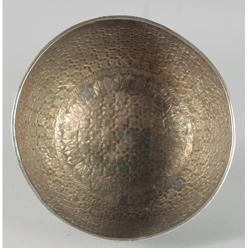 304 - A FINE 19TH CENTURY THAI WHITE METAL BOWL, with embossed and engraved floral motifs, 14.5cm diameter... 