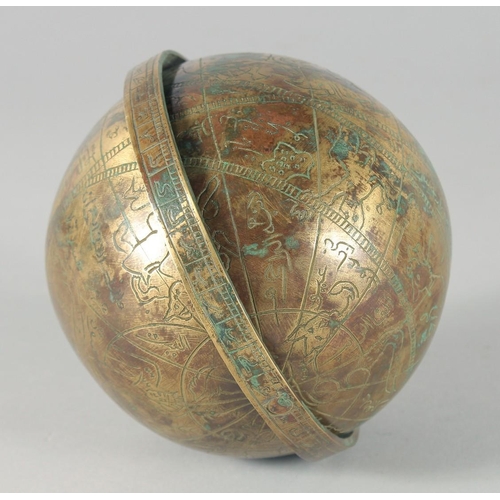 305 - A FINE ISLAMIC ENGRAVED BRASS CELESTIAL GLOBE, 12cm diameter.