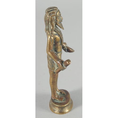 310 - A 19TH CENTURY INDIAN BRASS FIGURE OF SADHU, 13cm high.