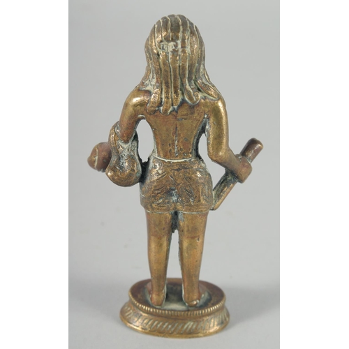 310 - A 19TH CENTURY INDIAN BRASS FIGURE OF SADHU, 13cm high.