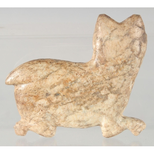 312 - A RARE EARLY ISLAMIC - POSSIBLY PERSIAN GHAZNAVID, CARVED MARBLE CAT, 12cm at widest point.