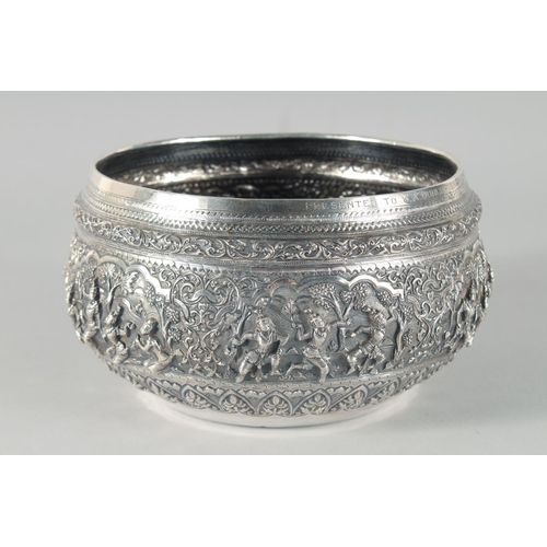 318 - A FINE 19TH CENTURY BURMESE SILVER BOWL, relief-decorated with scenes of multiple figures, weight 58... 