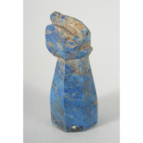 324 - A RARE EARLY ISLAMIC CARVED LAPIS LAZULI CHESS PIECE, 5cm.