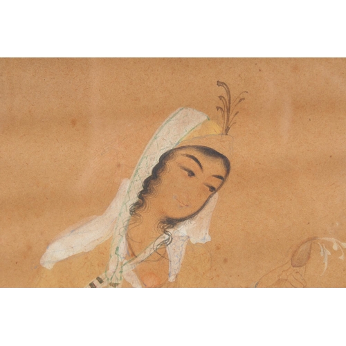 339 - A PERSIAN PAINTING ON PAPER depicting a seated figure, framed and glazed, 28.5cm x 20.5cm overall.