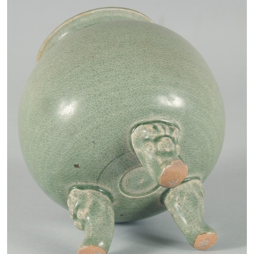 34 - A CHINESE CELADON GLAZE POTTERY BOWL, raised on three moulded legs, 15cm high, together with a small... 