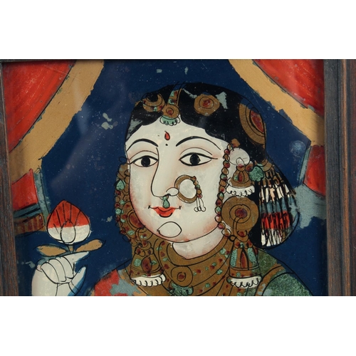 340 - TWO 19TH CENTURY SOUTH INDIAN - POSSIBLY TANJORE, REVERSE GLASS PAINTINGS ON GLASS of a noble couple... 