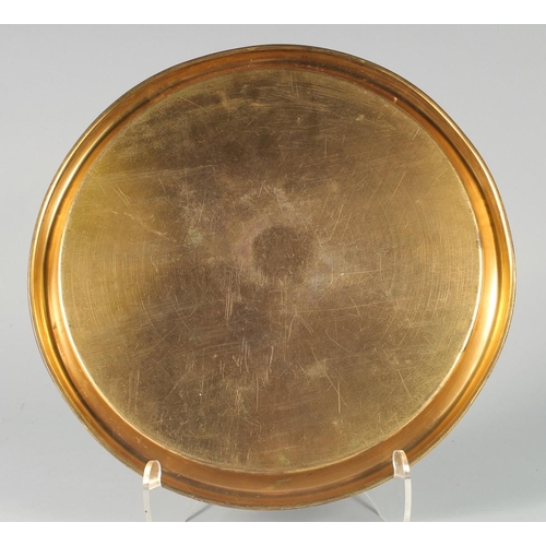 342 - A FINE OTTOMAN TURKISH GILDED COPPER TOMBAK TRAY, with engraved calligraphy and panels of mosques, 3... 