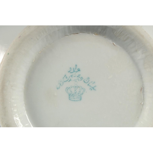 345 - TWO SIGNED IRAQI PORCELAIN ITEMS DEPICTING KING FAISAL, bowl 18cm diameter, saucer 13cm diameter, (2... 