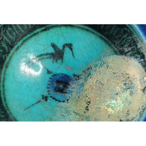 365 - AN EARLY RAQQA BLUE / TURQUOISE GLAZED BOWL, 10.5cm diameter.