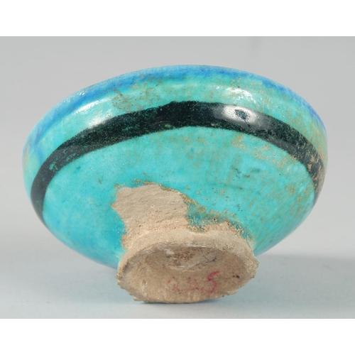 365 - AN EARLY RAQQA BLUE / TURQUOISE GLAZED BOWL, 10.5cm diameter.