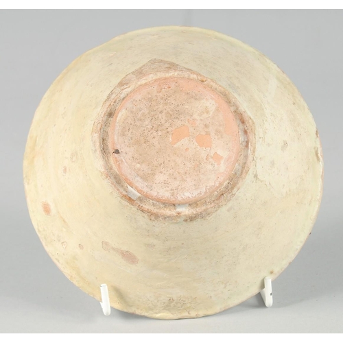 367 - AN EARLY NISHAPUR GLAZED POTTERY BOWL, with inscription to the interior, 15.5cm diameter.