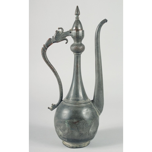 369 - A 16TH CENTURY SAFAVID TINNED COPPER EWER, with hinged lid and curved handle terminating in an open-... 